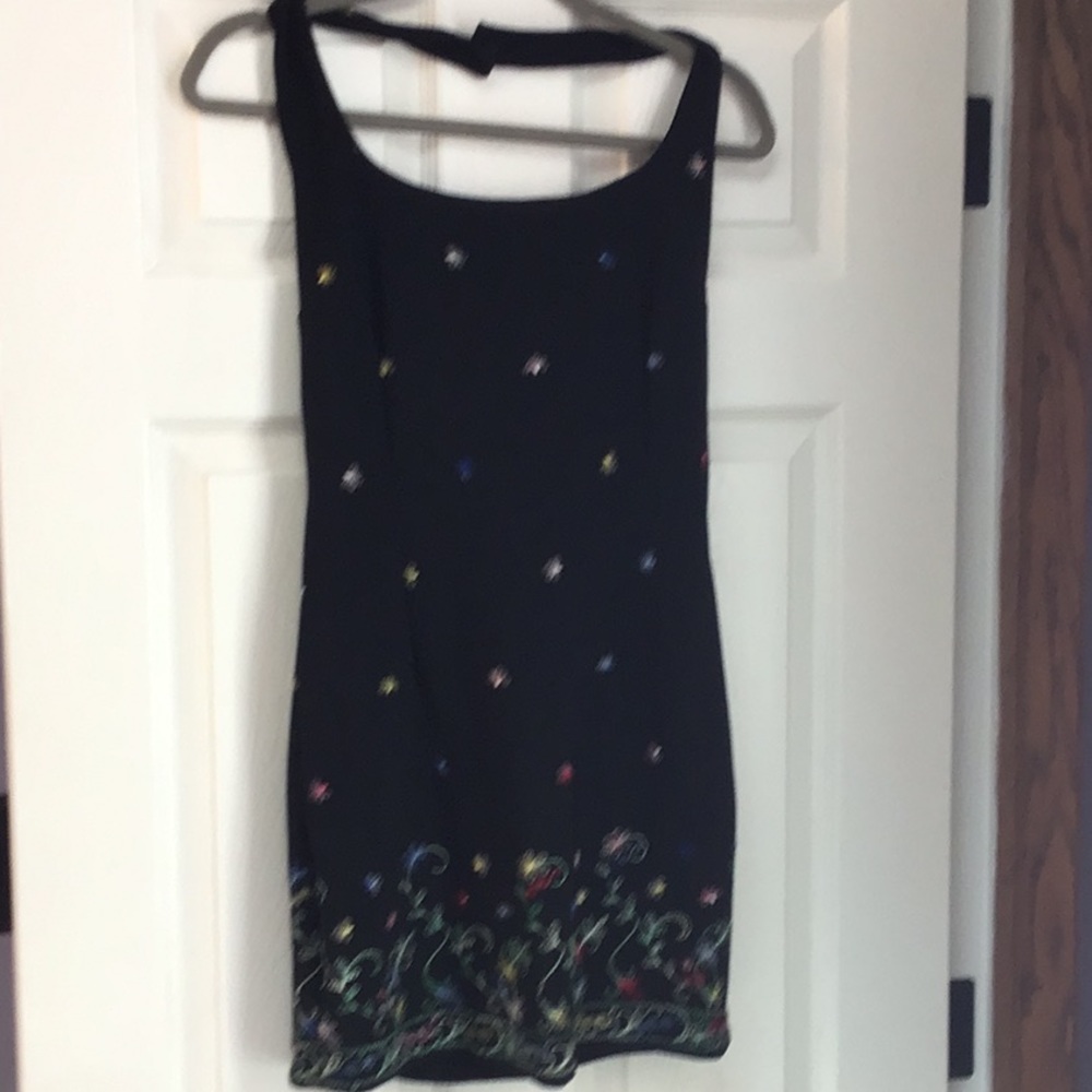 Black with vibrant colors worn once to a wedding